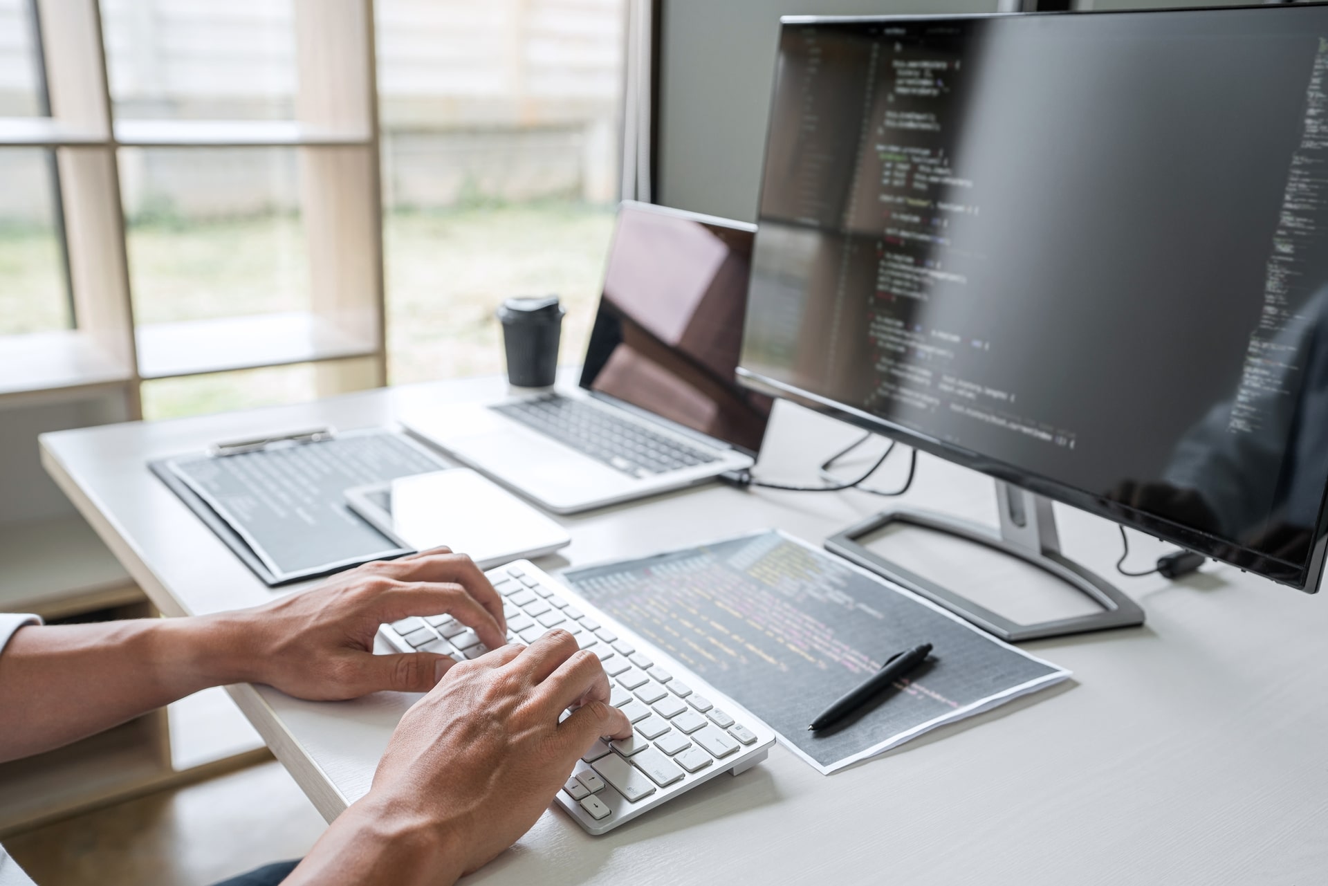 young-professional-programmer-working-at-developin-2023-11-27-05-36-11-utc-min